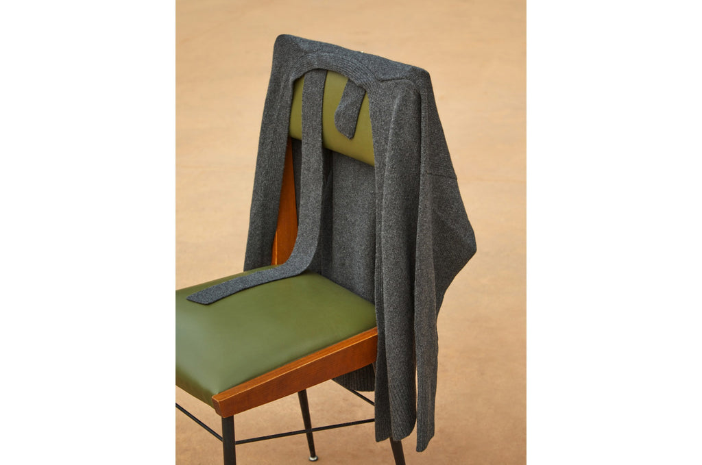 A jacket draped over a chair.