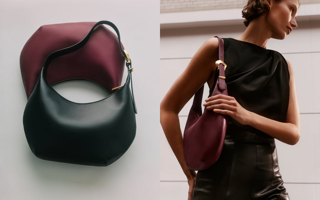 Person holding shoulder bag with close-up view of the bag in black and dark red on the left.