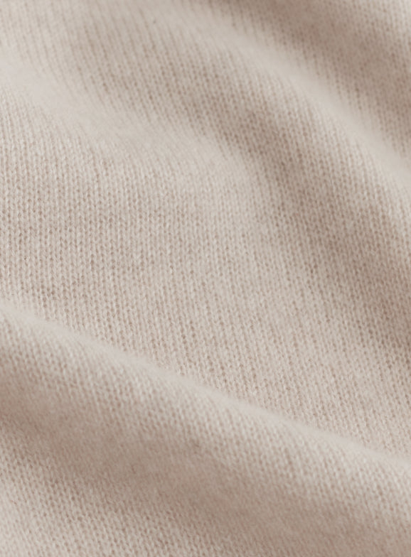 Close-up of textured fabric with visible weave pattern.