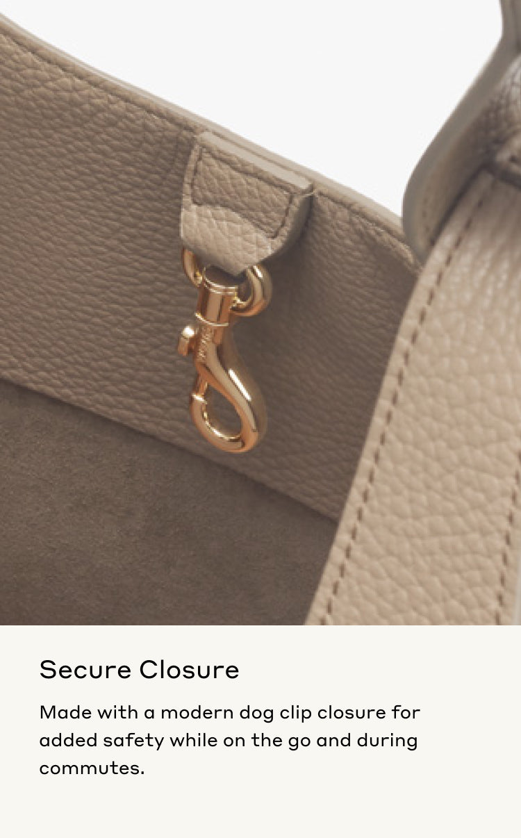 Close-up of a bag with a dog clip closure.
