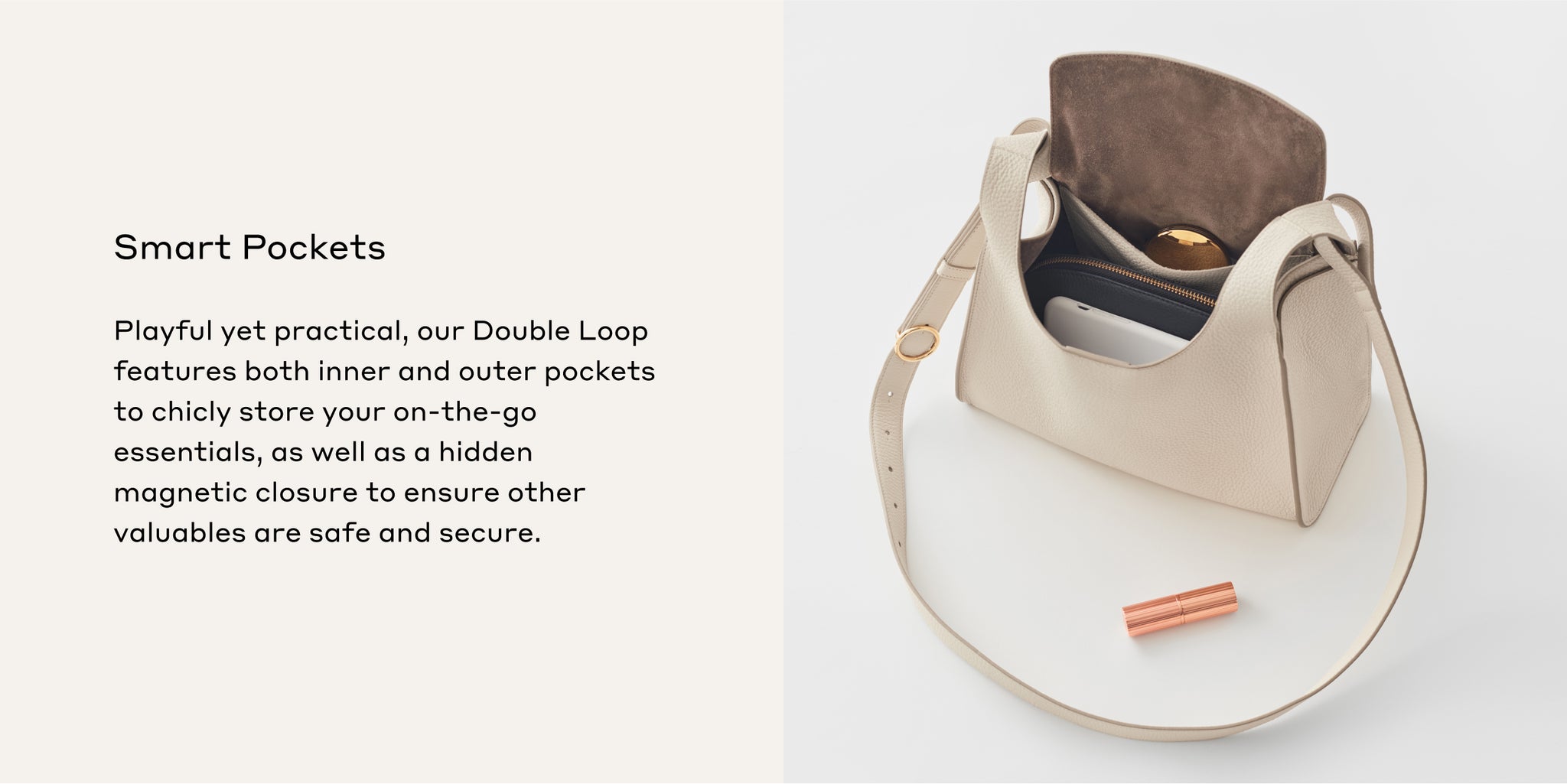 Handbag open to show internal pockets with items inside and alongside it.