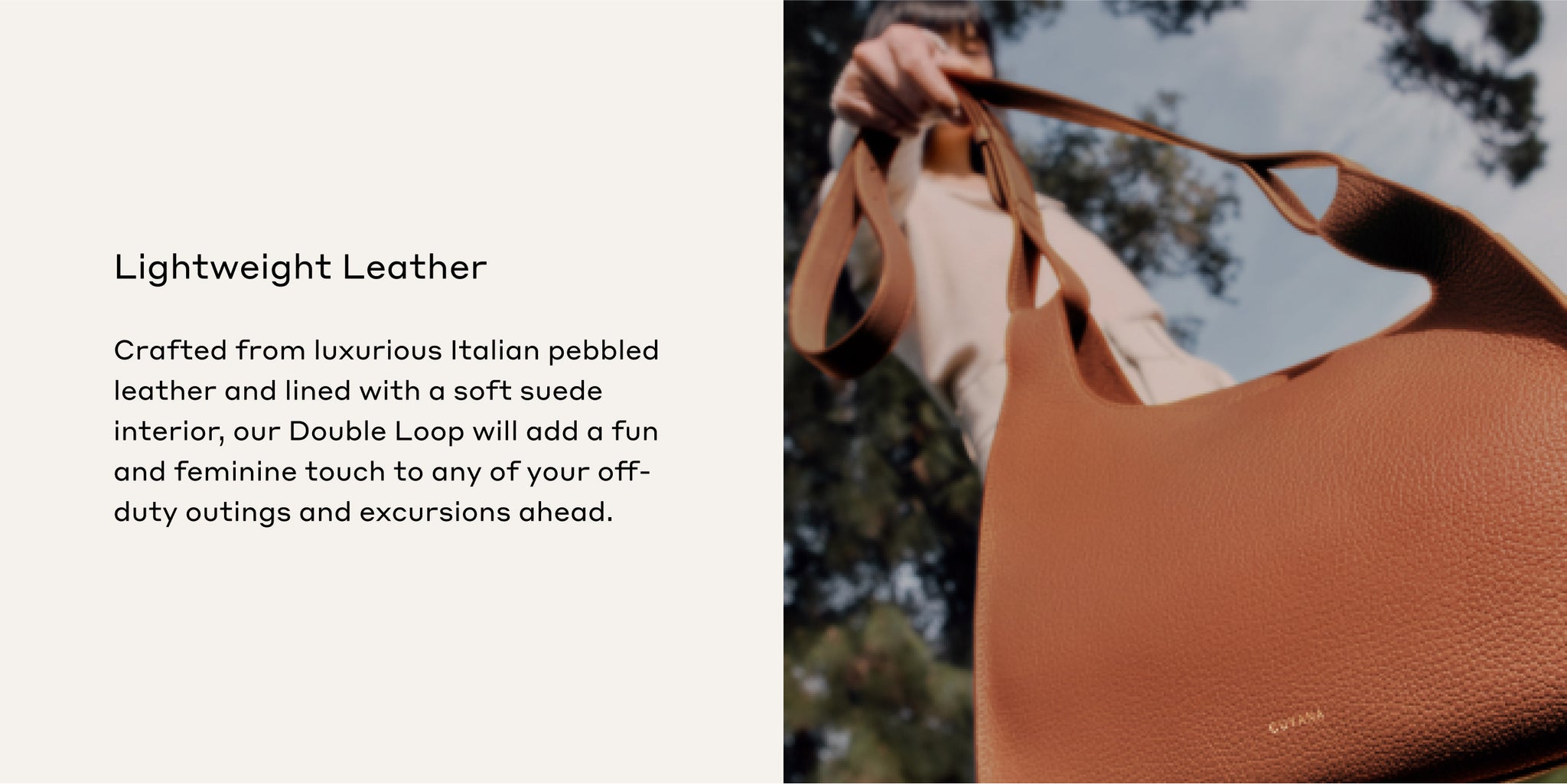 Person holding a handbag with trees in the background.