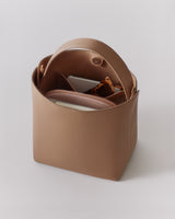 Open handbag with visible contents inside.