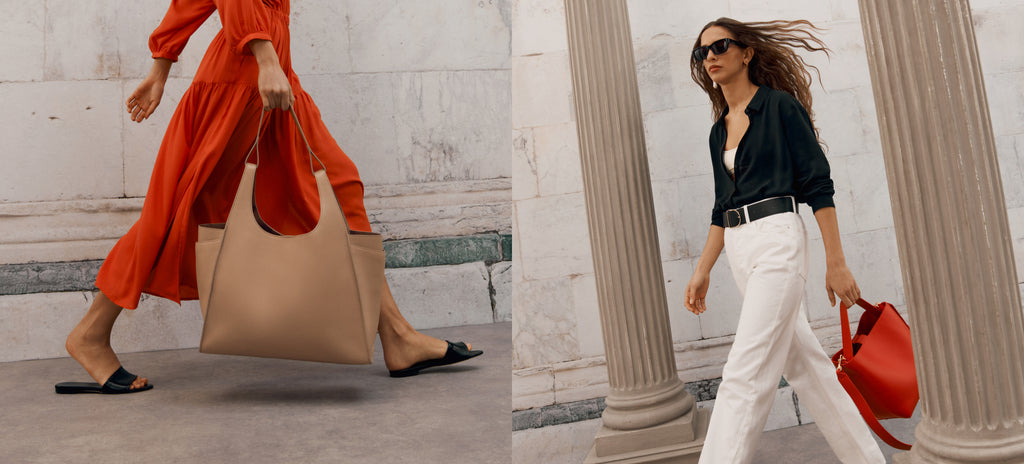Left: Model in orange dress carries the Cuyana Double Loop Satchel in color Cappuccino (Beige). Right: Modal in black shirt and white pants carries the Cuyana Linea Bucket Bag in color Lipstick (Red).