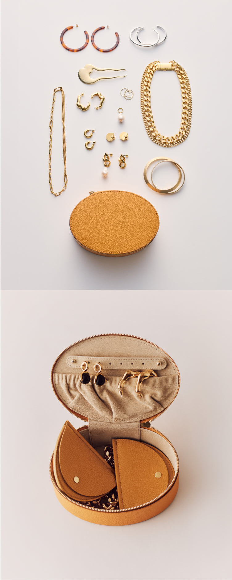 Jewelry collection displayed with a small round travel case open to show organized pieces.