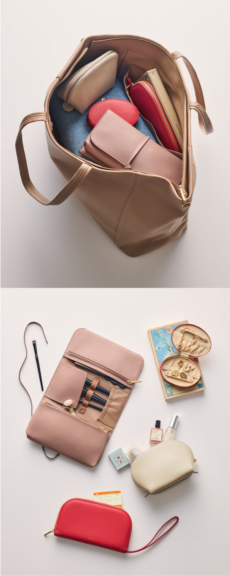 Open travel bag with various pouches and a book displayed around it.