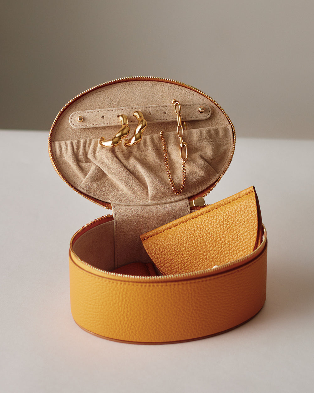 Large Jewelry Case Open jewelry case with earrings and chain inside, card holder in front.