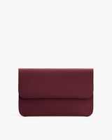Small textured leather clutch