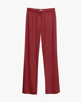 Loose-fitting pants with an elastic waistband.