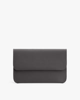 Rectangular clutch bag with flap closure.