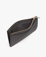 Simple zippered wallet with a textured surface.