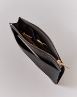 Open pouch with zipper showing a pen and key inside