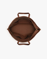 Open tote bag with handles and compartments visible from above.