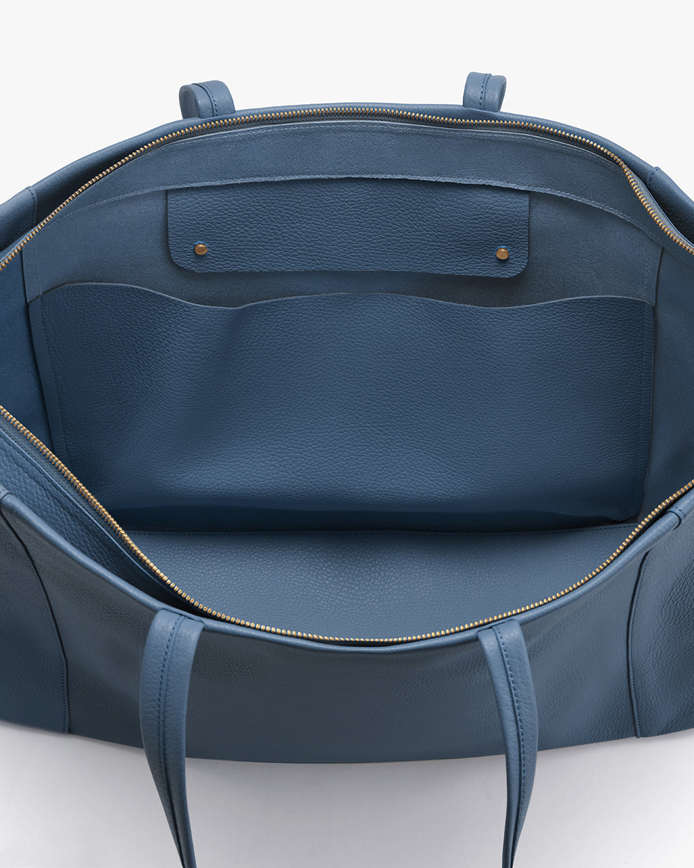 Easy Overnighter Bag Open tote bag with interior pockets and zipper.