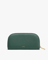 Small leather pouch with a zipper on a plain background