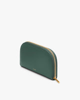 Rectangular zippered leather pouch standing upright.