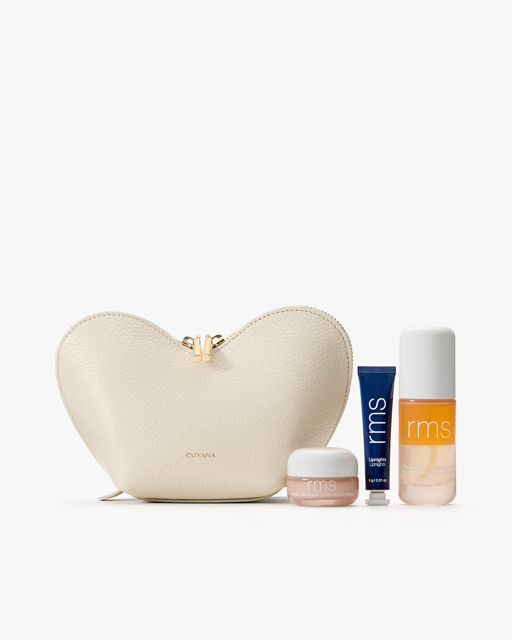 Heart-shaped pouch with skincare products in jars and tube.