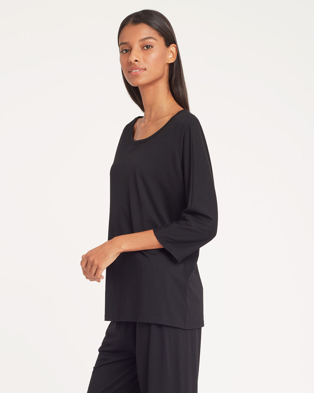 Organic Pima Drape-Back Top Woman standing and looking into the camera.