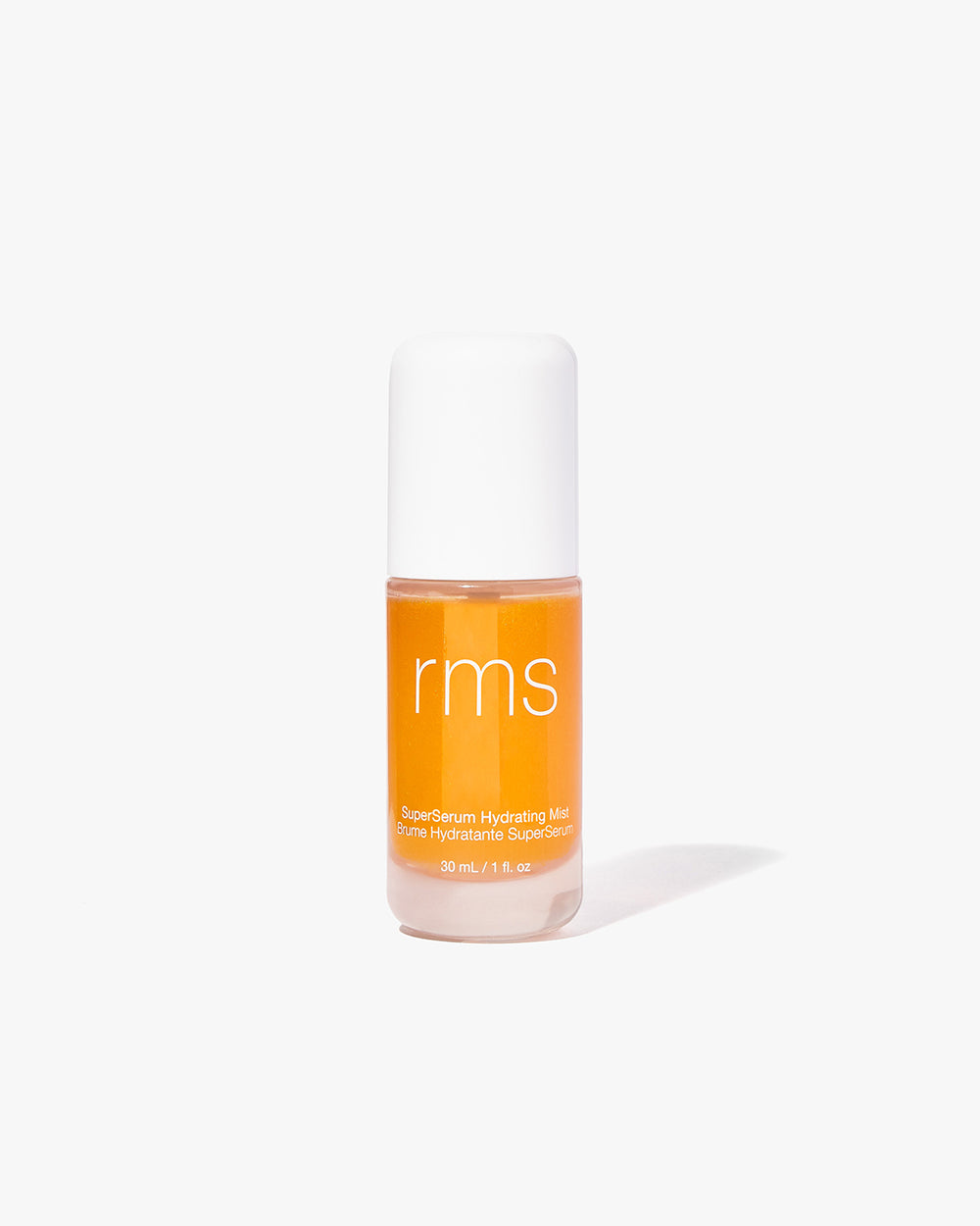 Small bottle of RMS skin serum on white background