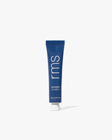 A tube of rms skincare cream on a plain background.