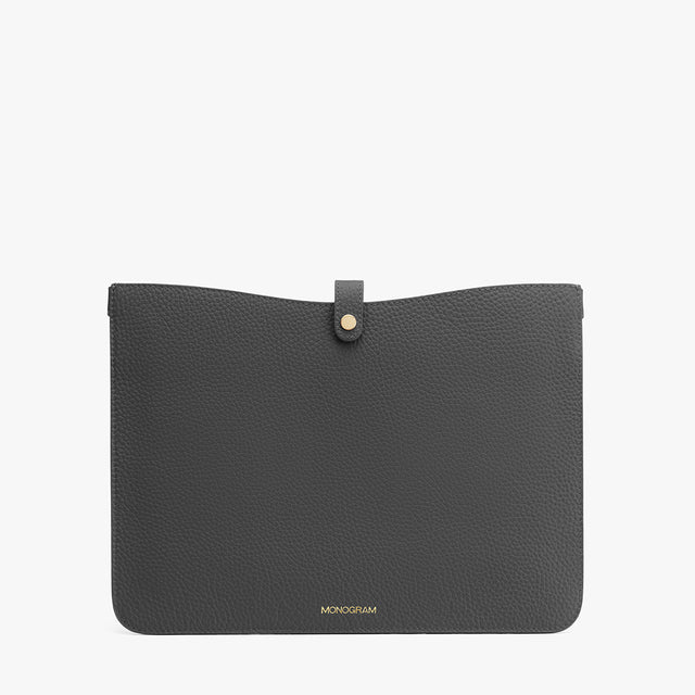 Clutch bag with a central fastener and a brand logo.
