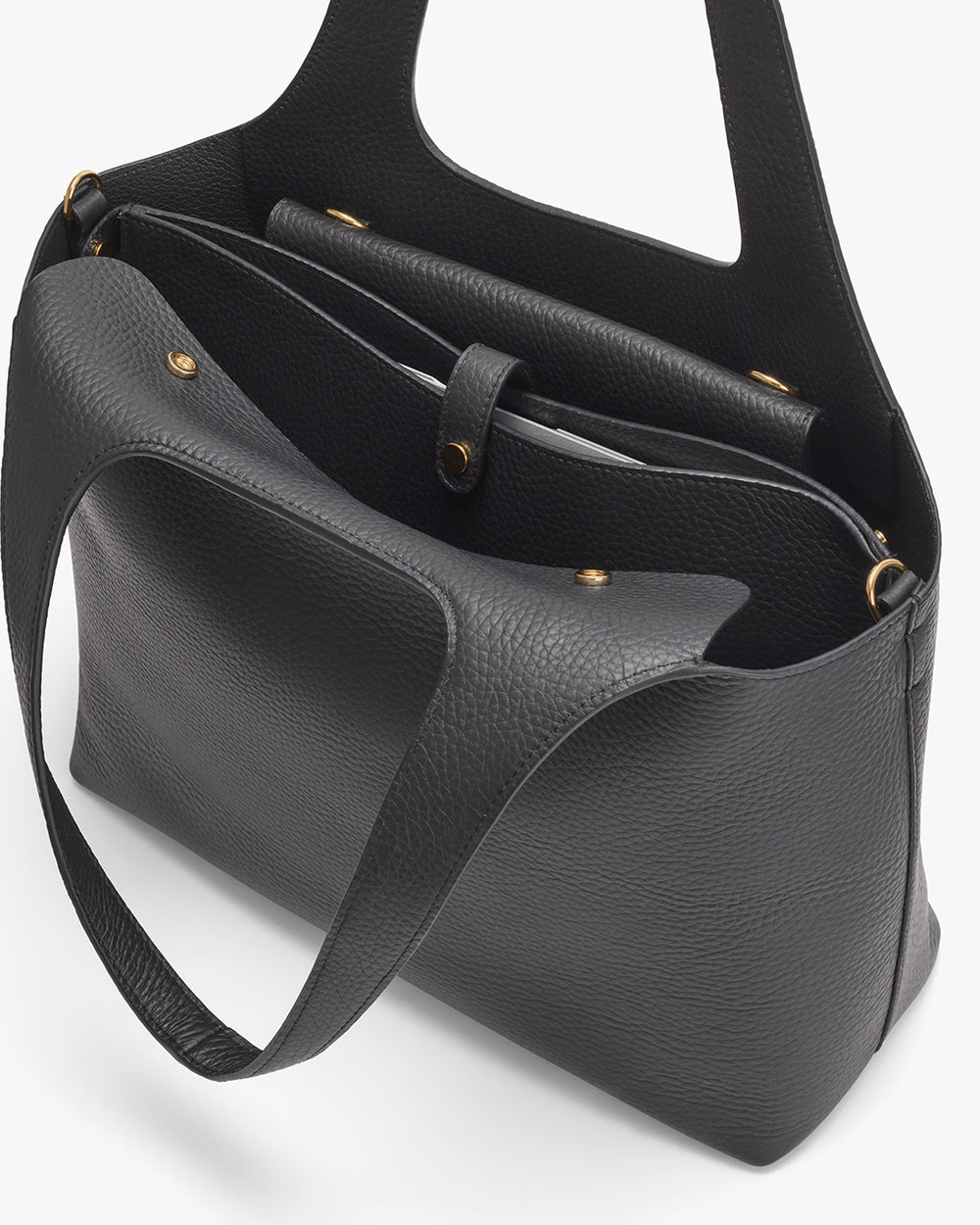Open handbag with handles and a shoulder strap.