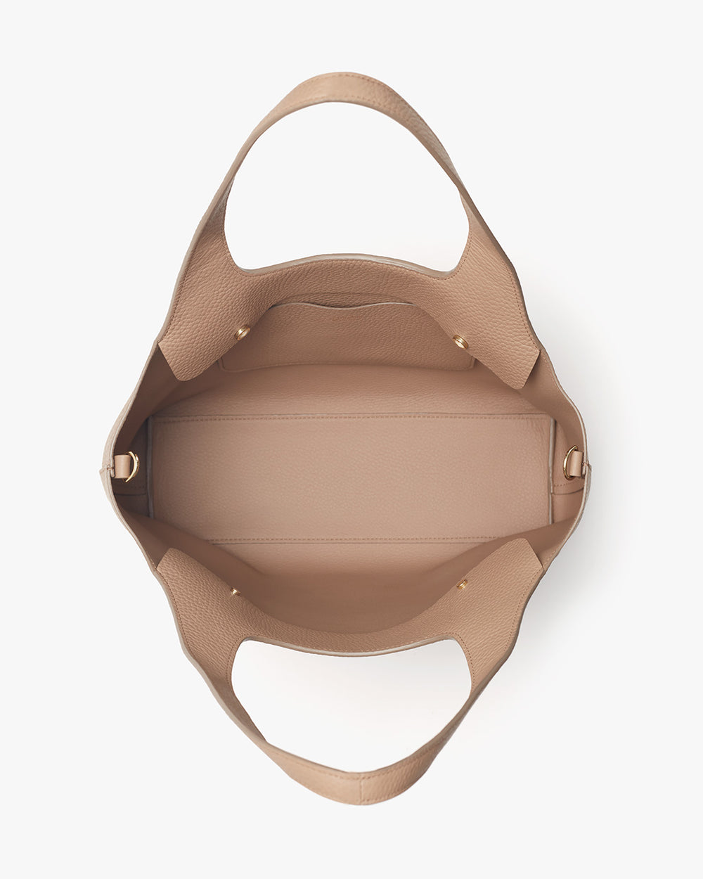 Open handbag viewed from above showing interior structure and straps.