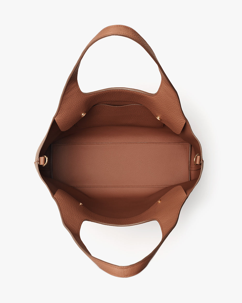 Top view of an open handbag showing the interior.