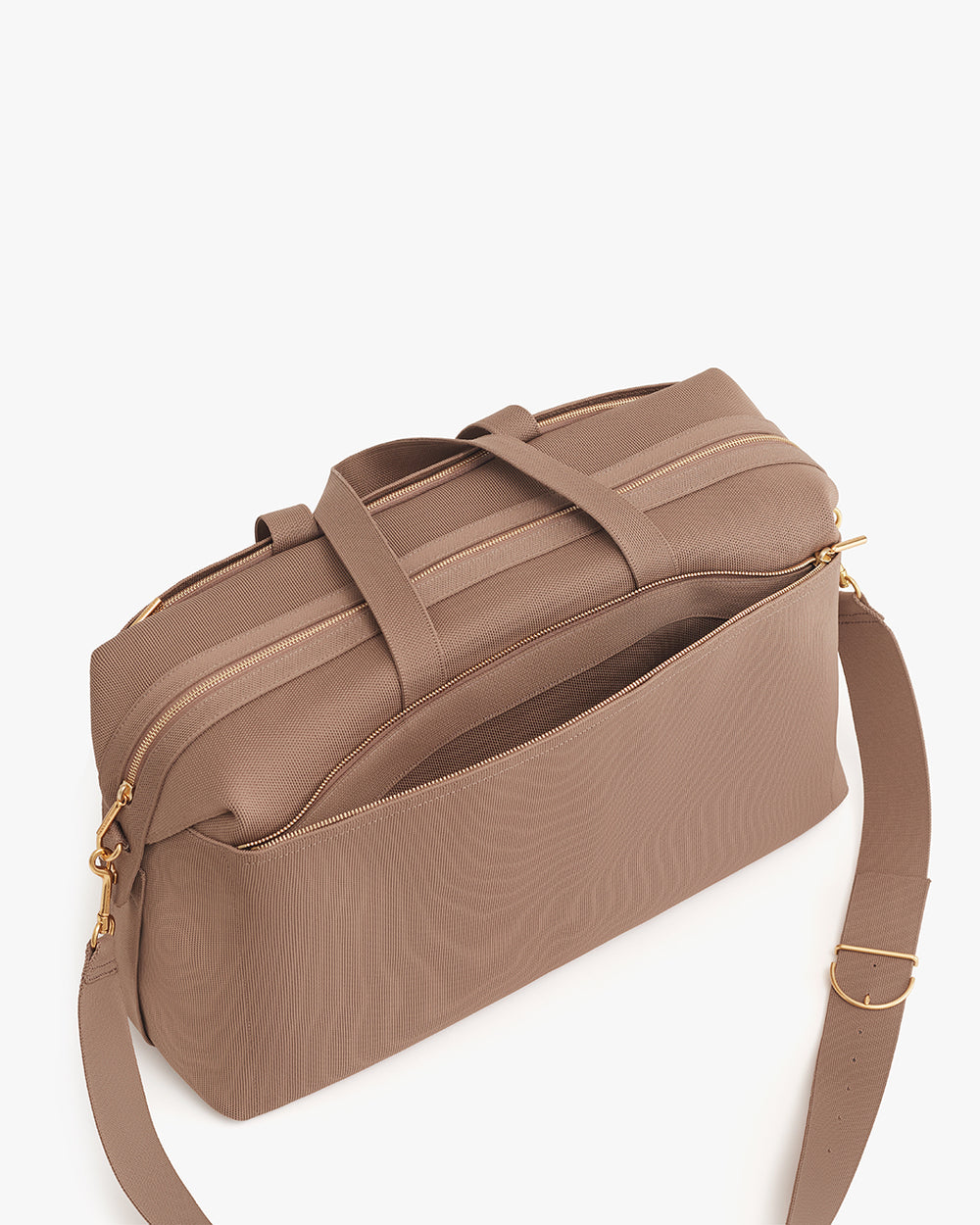 Weekender Bag (Recycled Knit) Travel bag with zippered compartments and a shoulder strap.