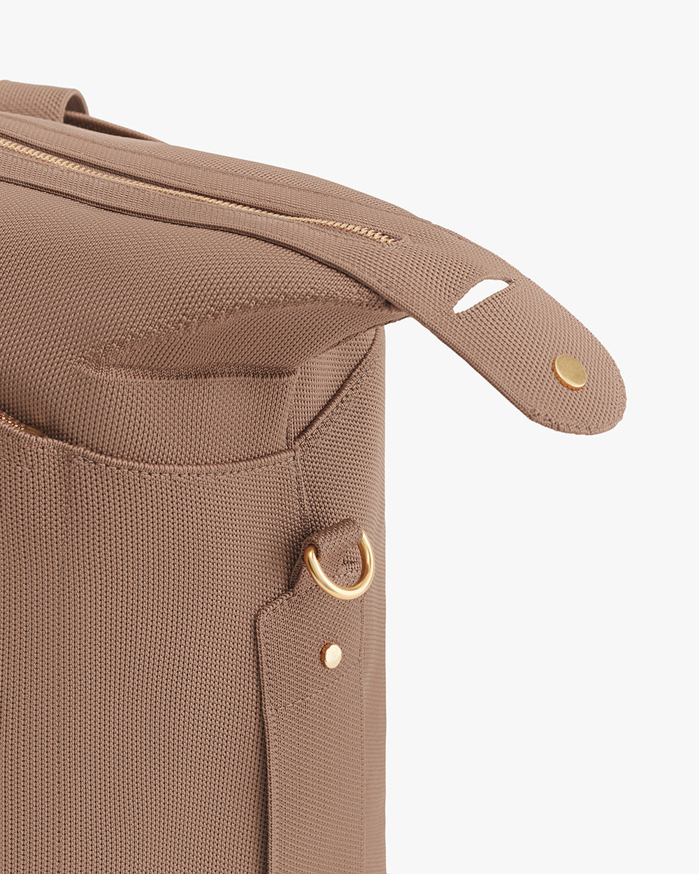 Weekender Bag (Recycled Knit) Close-up of a travel bag corner with zipper and button details.