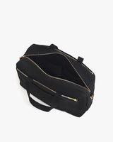 Open travel bag with shoulder strap and zippered compartments