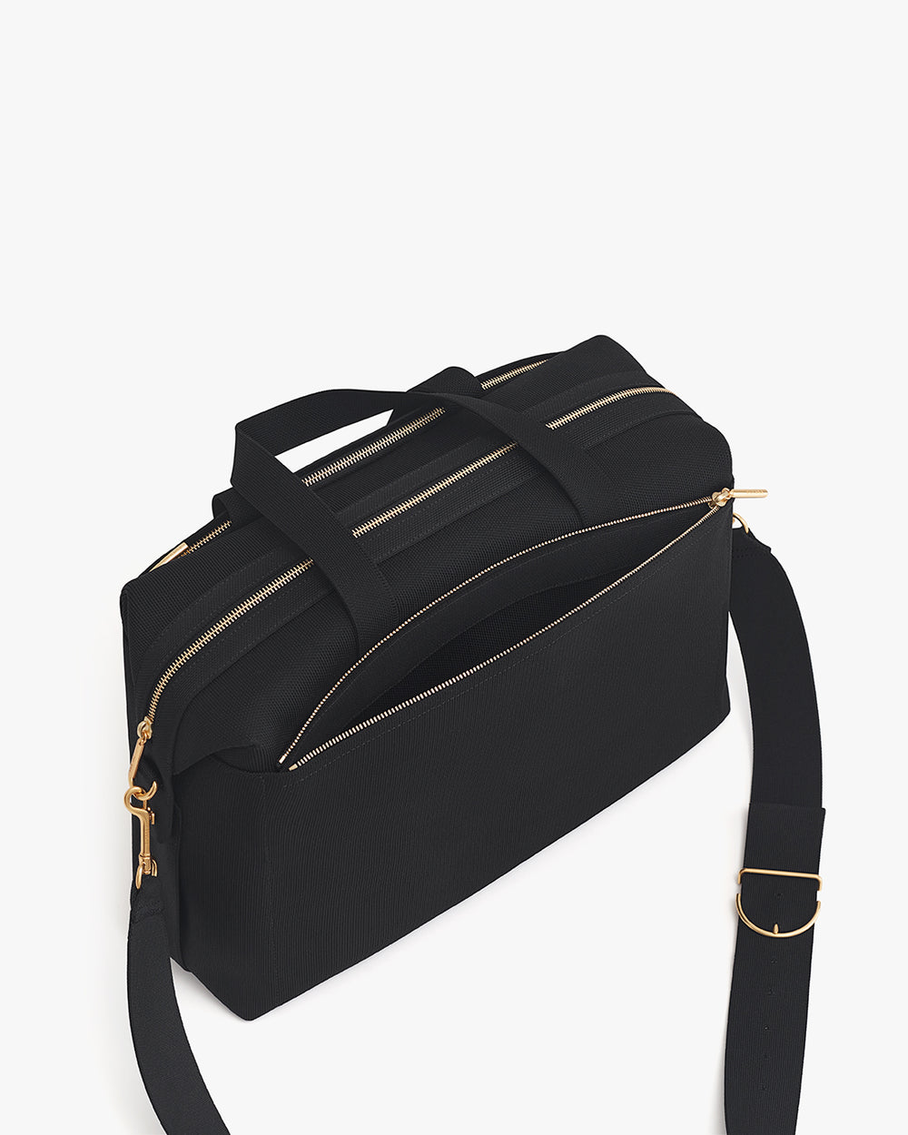 Travel bag with shoulder strap and zippered compartments