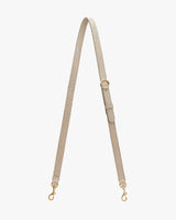 Adjustable strap with metal clasps and buckle.