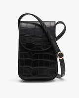 Small handbag with croc-embossed leather and shoulder strap.