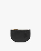 Small zippered pouch with textured exterior and rounded bottom.