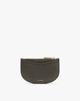 Small zippered half-moon shaped pouch standing upright on a plain background.