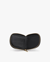 Open wallet with zipper on a plain background.