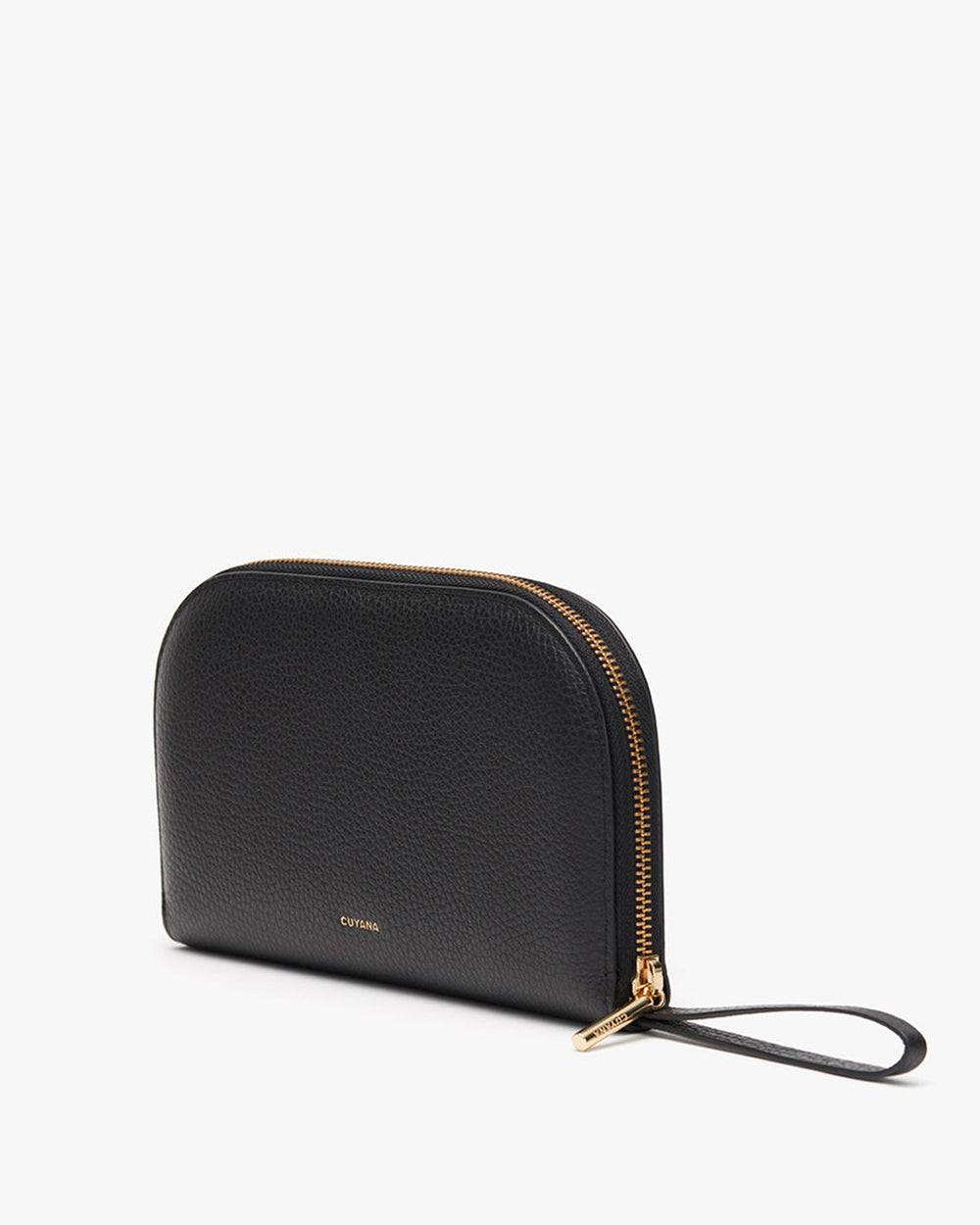 Handbag with zipper and wrist strap standing upright against a plain background
