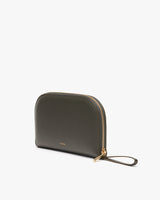 Small zippered pouch with a wrist strap standing upright