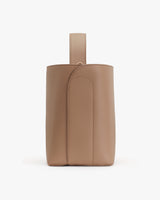 Backpack with a top handle and vertical zipper.