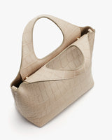 croc-embossed leather handbag with two handles.