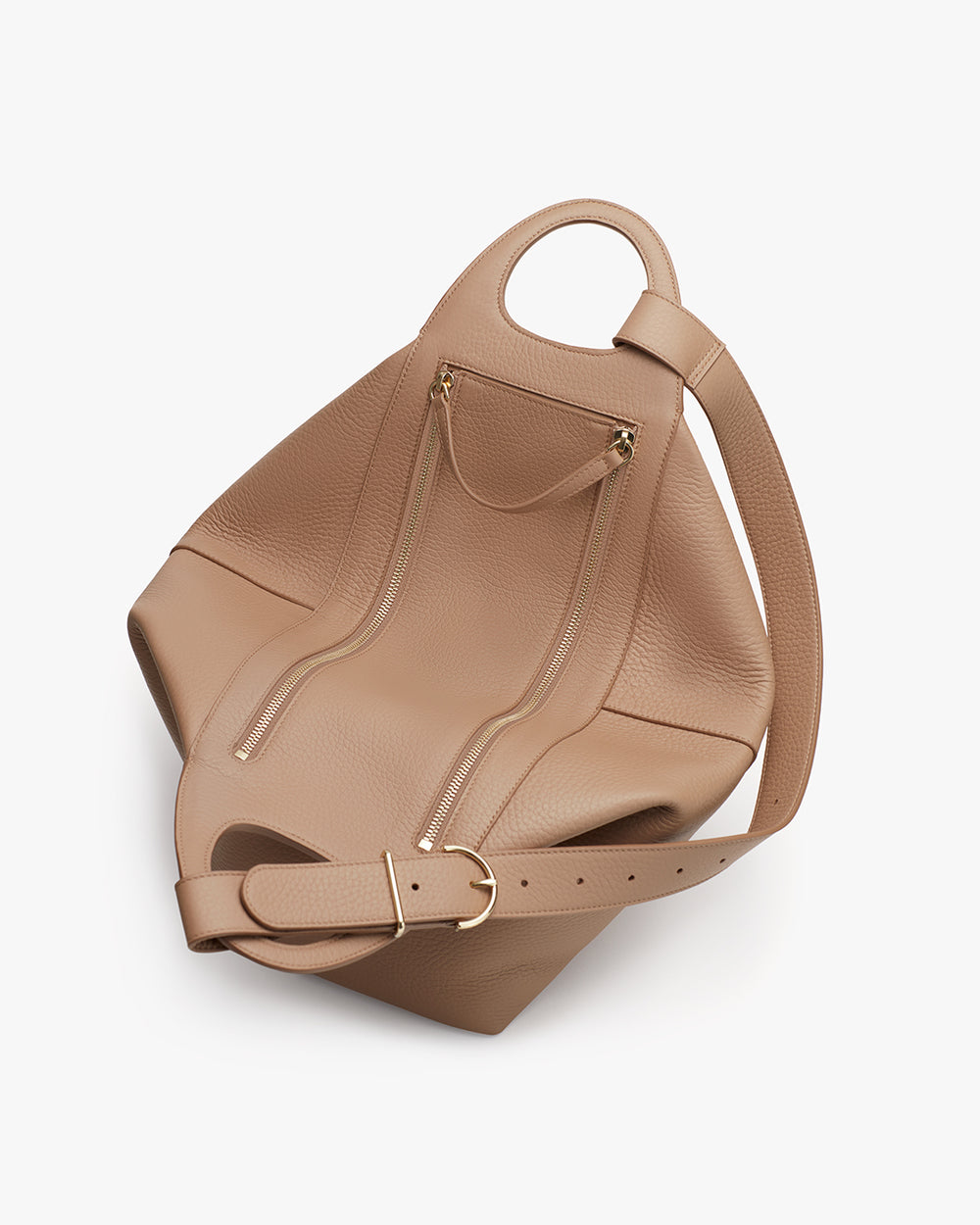 Oversized Paloma Bag Backpack with top handle and adjustable strap.