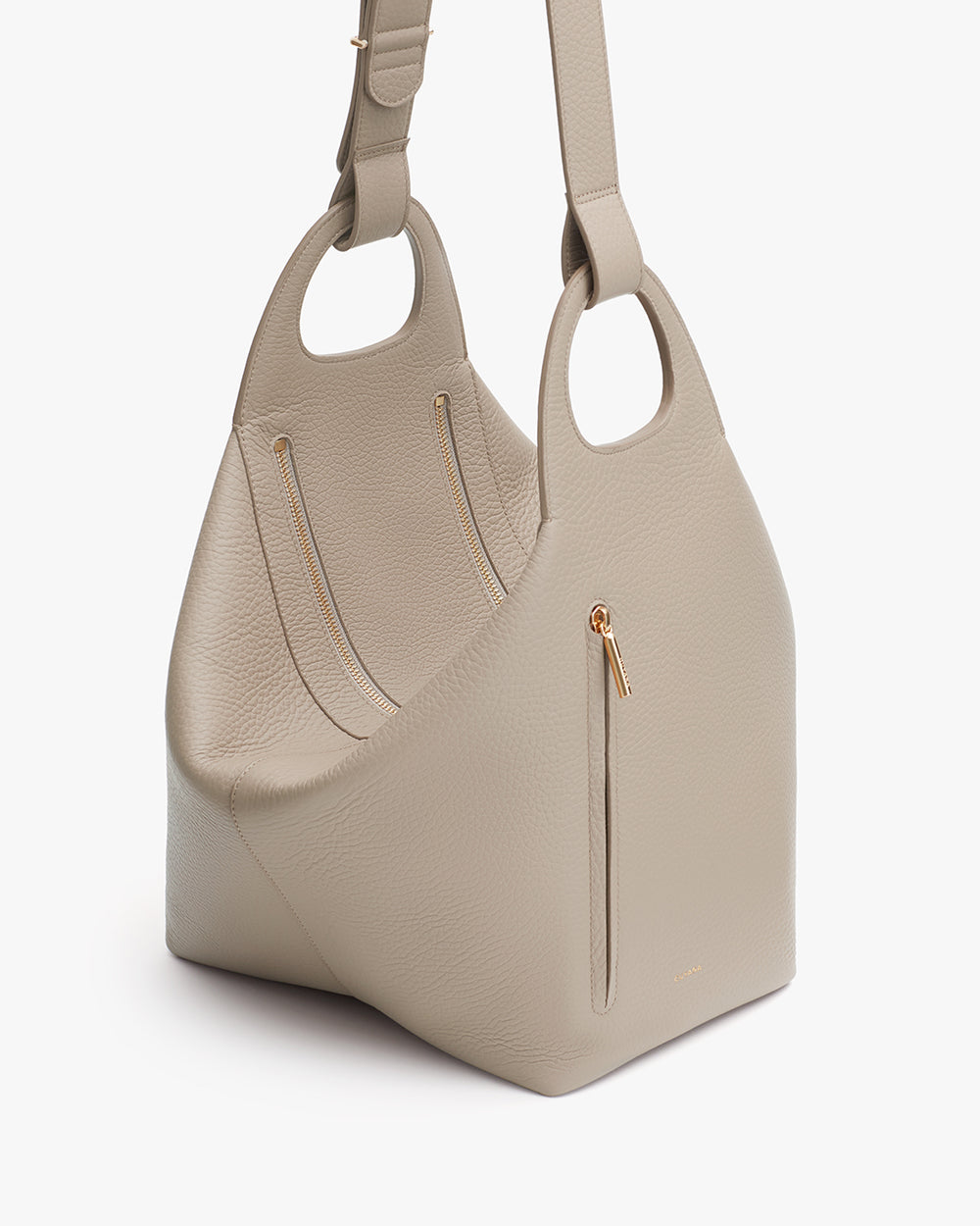 Handbag with front zipper and shoulder strap.