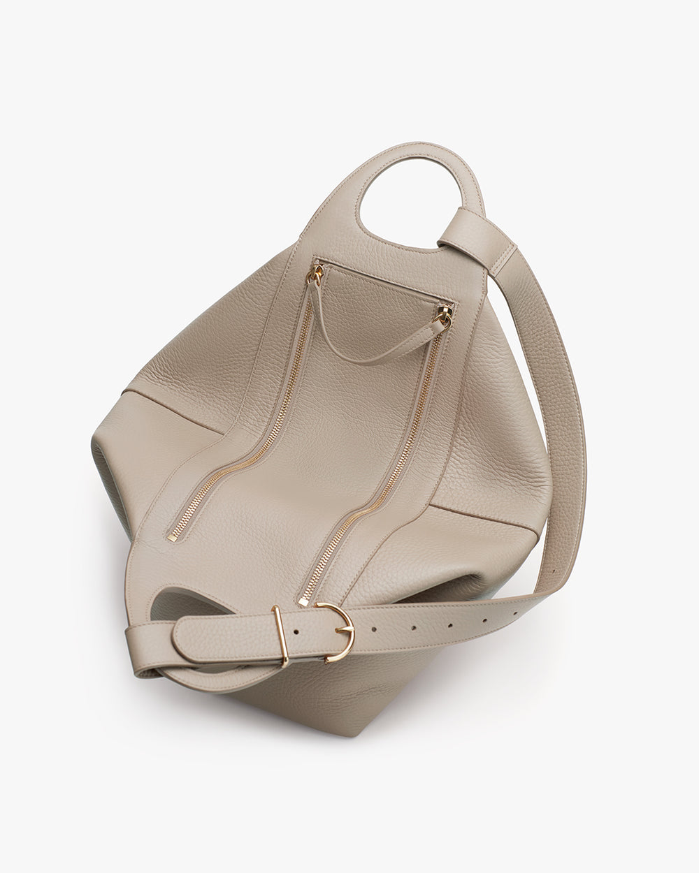 Handbag with top handle and adjustable shoulder strap.