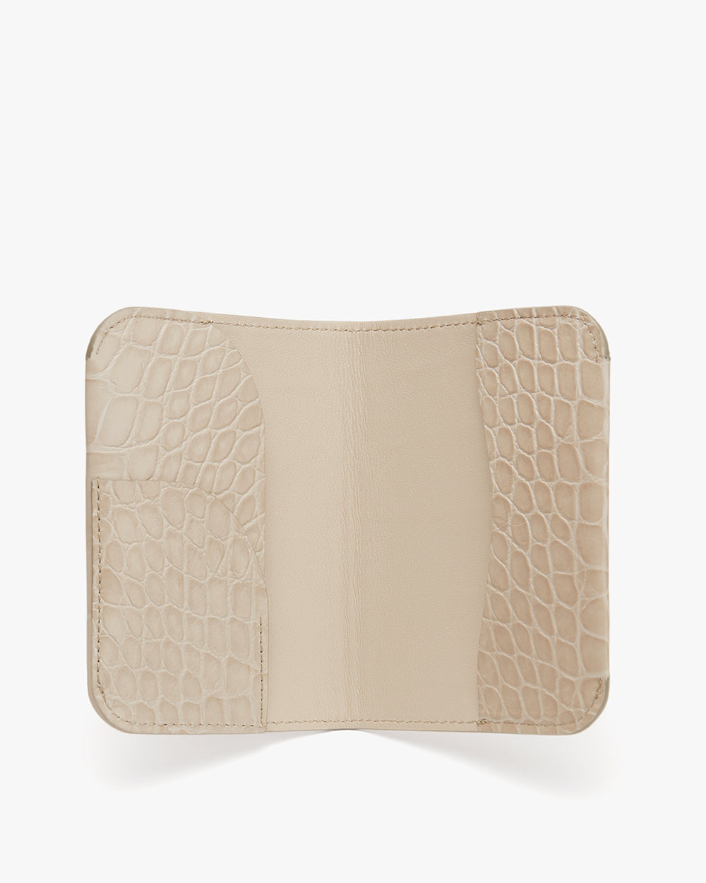 Wallet with textured and smooth sections, open view.