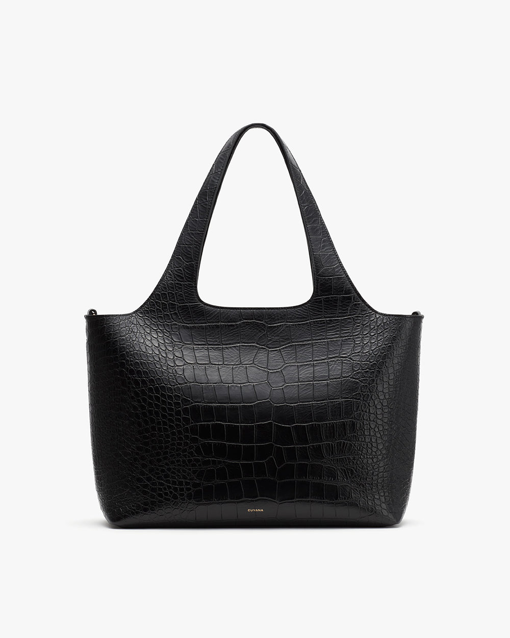 Handbag with textured pattern and a single handle, against a plain background.