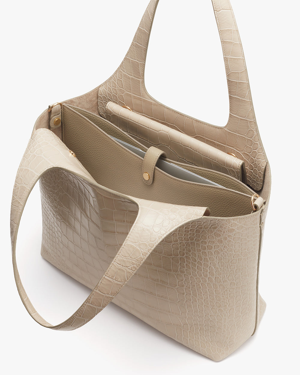 Open handbag with visible interior compartments and a top handle