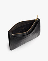 Zippered wallet with textured surface shown open on white background.