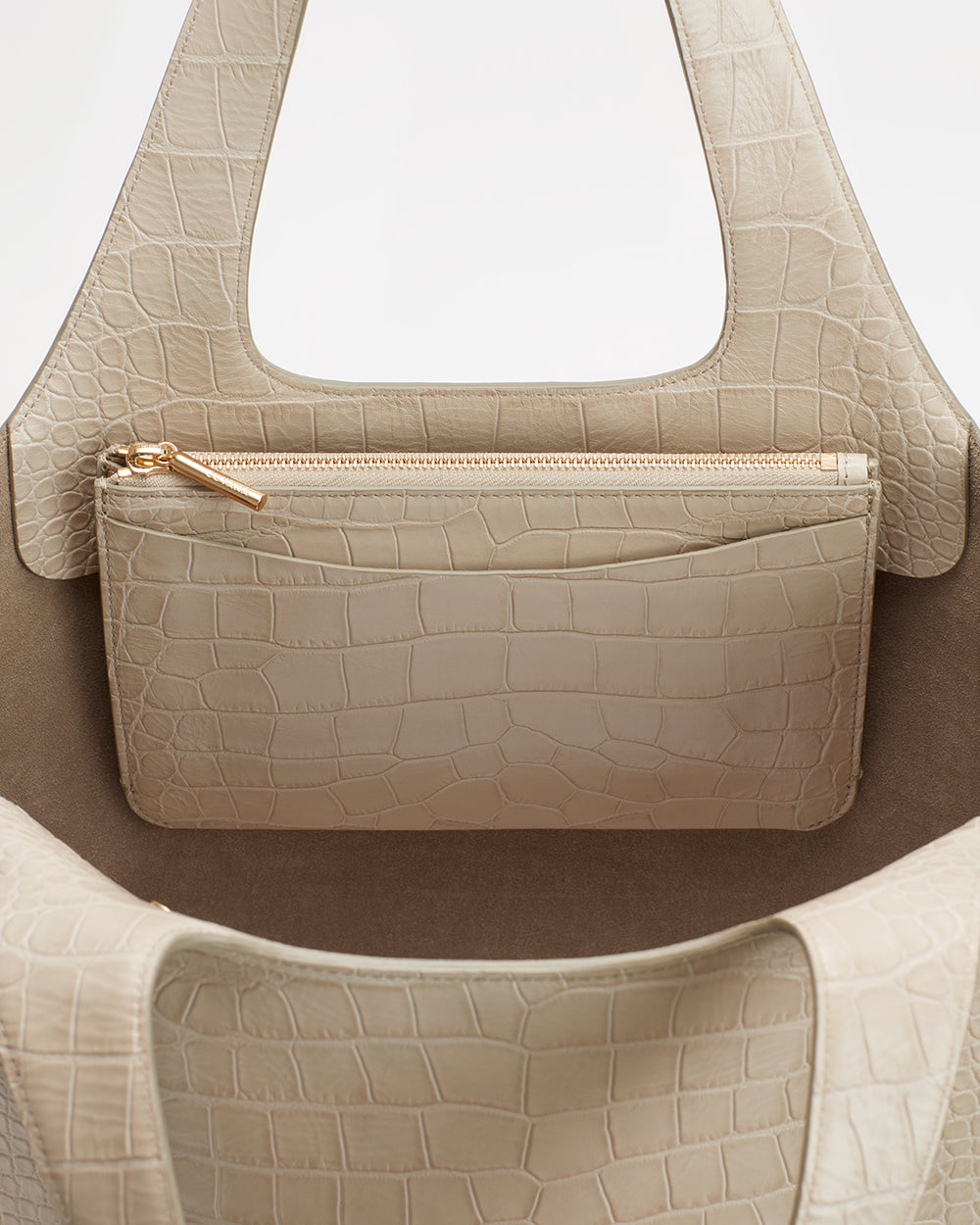 System Zipper Pouch (Croco) Handbag with a matching zipper pouch inside.