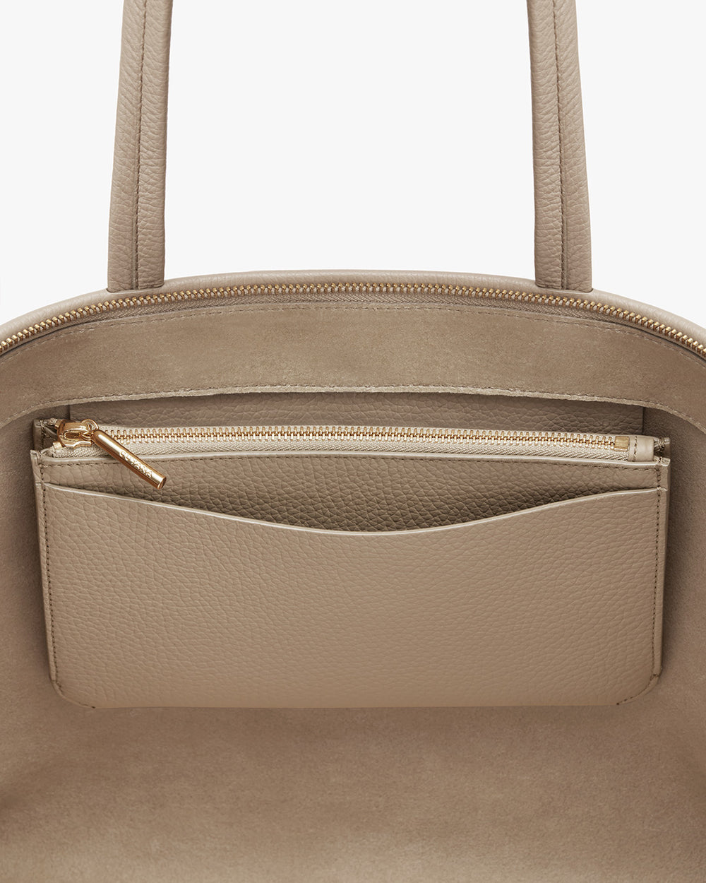 System Zipper Pouch Close-up of a handbag with a zipper pocket on the exterior.